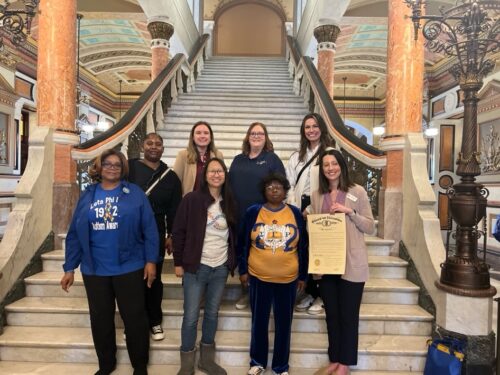 Advocates with the Governor's Proclamation at the Illinois State Capitol for Autism Advocacy Day